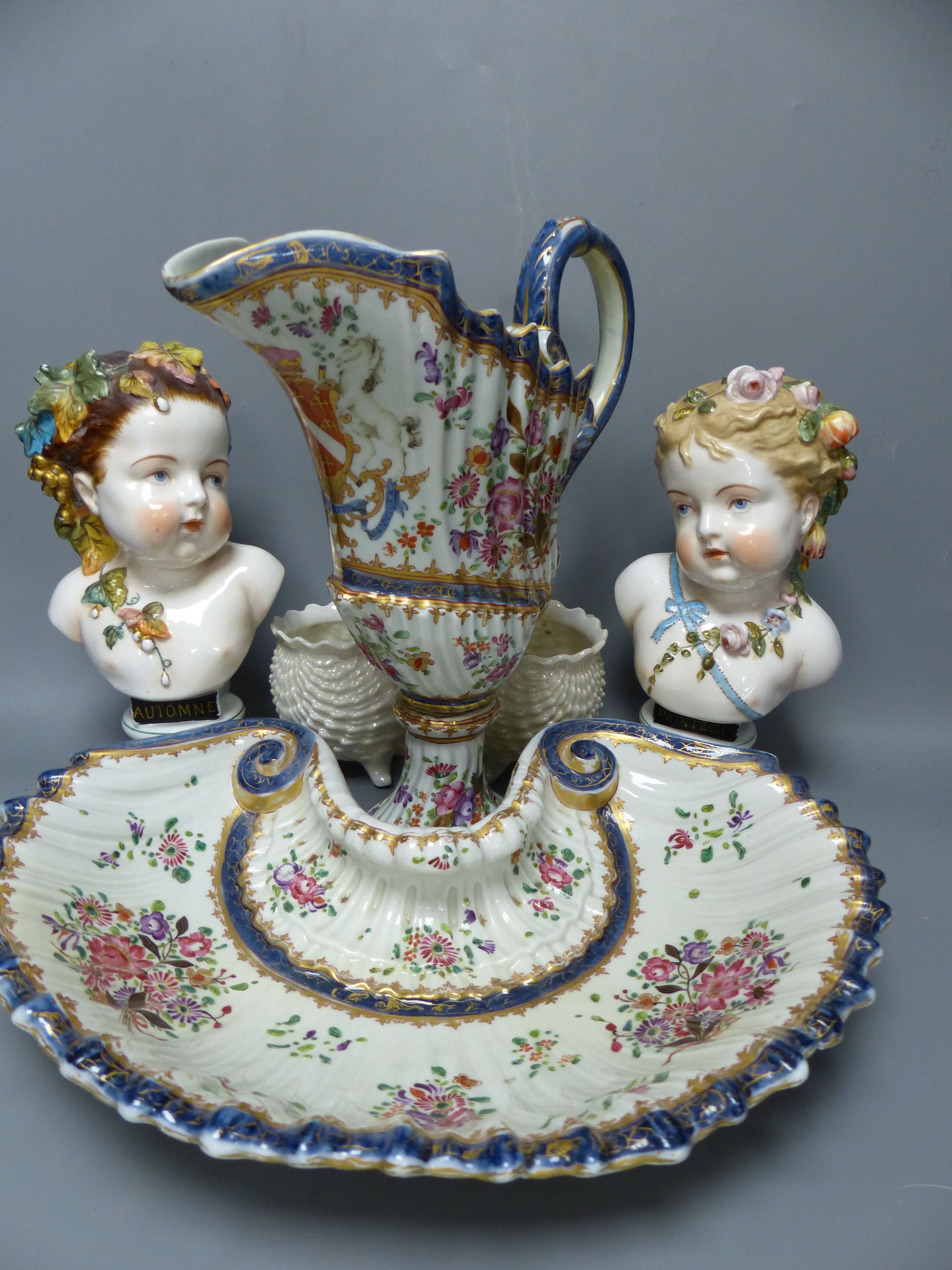 A pair of French porcelain busts Automne and Printemps, a Samson ewer and basin in the Chinese export style and a pair Belleek styl